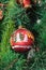 Christmas tree hanging ornament, red globe, close up