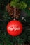 Christmas tree hanging ornament, red globe with write happy new