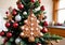 A Christmas Tree With Homemade Gingerbread Ornaments, In A Kitchen Setting. Generative AI