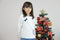 Christmas tree and Japanese student girl