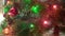 Christmas Tree With Lanterns. Colored lights Flashing on pine branches