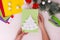 Christmas tree made of cotton pads. Childrens Christmas craft card. Step-by-step instruction. Step 6