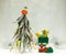 This Christmas tree is made of dried fish. New year for the fisherman. The tree is decorated with floats and fishing tackle. A