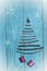 Christmas tree made from dry sticks on wooden, blue background. Snow flaks image. Christmas tree ornament, craft, gifts