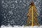 Christmas tree made of italian spaghetti, salt and colorful pepper on a slate background.