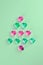 Christmas tree made of pink and green decorative glass hearts