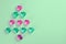 Christmas tree made of pink and green decorative glass hearts