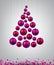 Christmas tree with magenta christmas balls.