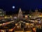 Christmas tree night starry sky in Tallinn market place panorama , full moonlight  city town Hall Square Illuminated blurred  lig