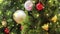 Christmas tree ornaments on defocused lights background