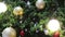 Christmas tree ornaments on defocused lights background