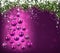 Christmas tree with purple christmas balls.