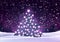 Christmas tree with purple lights in dark landscape