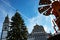 Christmas tree and pyramid at town hall low-angle