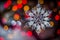 Christmas tree snowflake decoration on lights background