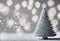 Christmas tree with snowflakes and bokeh on grey background