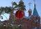 Christmas tree on the street, next to the temple, decorated with balls