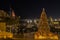 Christmas tree surrounded by lights and buildings in Souk Madinat Jumeirah in Dubai