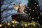 Christmas tree topper Christmas angel decoration element. sits atop the Christmas tree, illuminated by surrounding lights