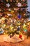 Christmas tree with toys and decor shines colored lights