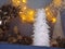 A Christmas tree of white feathers on the background of a wreath of garlands