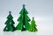 Christmas trees with silver decorations, minimalist