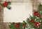 Christmas vintage card with poinsettia, holly and fir branches
