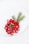 Christmas white plate with christmas pine branches, decorations. Christmas holidays background. copy space.