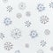Christmas or winter concept. Pattern of various handmade snowflakes made from beads and bugle on light blue background