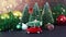 Christmas winter decoration with blinking lights, Christmas trees and red car with tree on the roof