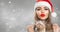 Christmas winter fashion girl on holiday blurred winter background. Beautiful New Year and Xmas holiday makeup