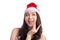 Christmas Woman. Beauty Asian Model Girl in Santa Hat Thinking S