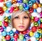 Christmas Woman with Colored Balls. Face of Beautiful Girl