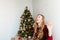 Christmas Woman. Portrait of a girl. Girl smiling. Girl celebrates Christmas