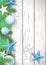 Christmas wooden background with green branches and blue ornaments