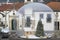 Christmas wooden and pine cabin inside giant transparent bubble with church in the background in Aroucas Portugal