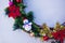 Christmas wreath decorated with fir-tree balls and toys, tinsel