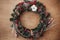 Christmas wreath, flat lay. Fir branches with red berries,pine c