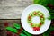 Christmas wreath fruit snack for kids, creative food art