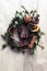 Christmas wreath with golden baubles and berries