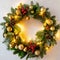 Christmas wreath hanging on white wall, copy space inside it.