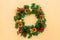 Christmas Wreath Made of Naturalistic Looking Pine Branches Decorated