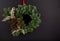 Christmas Wreath, With Pine Cones, Handmade. Isolated on Black Background.