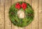 Christmas Wreath on a Rustic Wood Fence