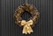 Christmas wreath on a rustic wooden front door