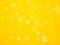 Christmas yellow background with snowflakes