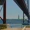 Christo Rei statue, framed by the Pinte 25 de Abril bridge, Lisbon