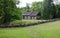 Christopher House, built ca. 1720, and old stone fence, at Historic Richmond Town, Staten Island, NY, USA