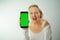 Chroma Key Phone green screen space for advertising Hurray Victory has found Fabulous Photo of a woman in a white T