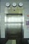 Chrome elevator doors & world time zones, Cleveland International Airport